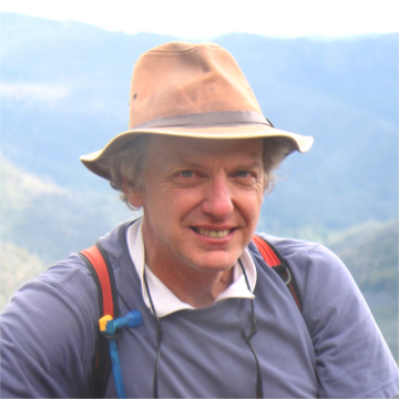 Jerry D Davis headshot in the mountains