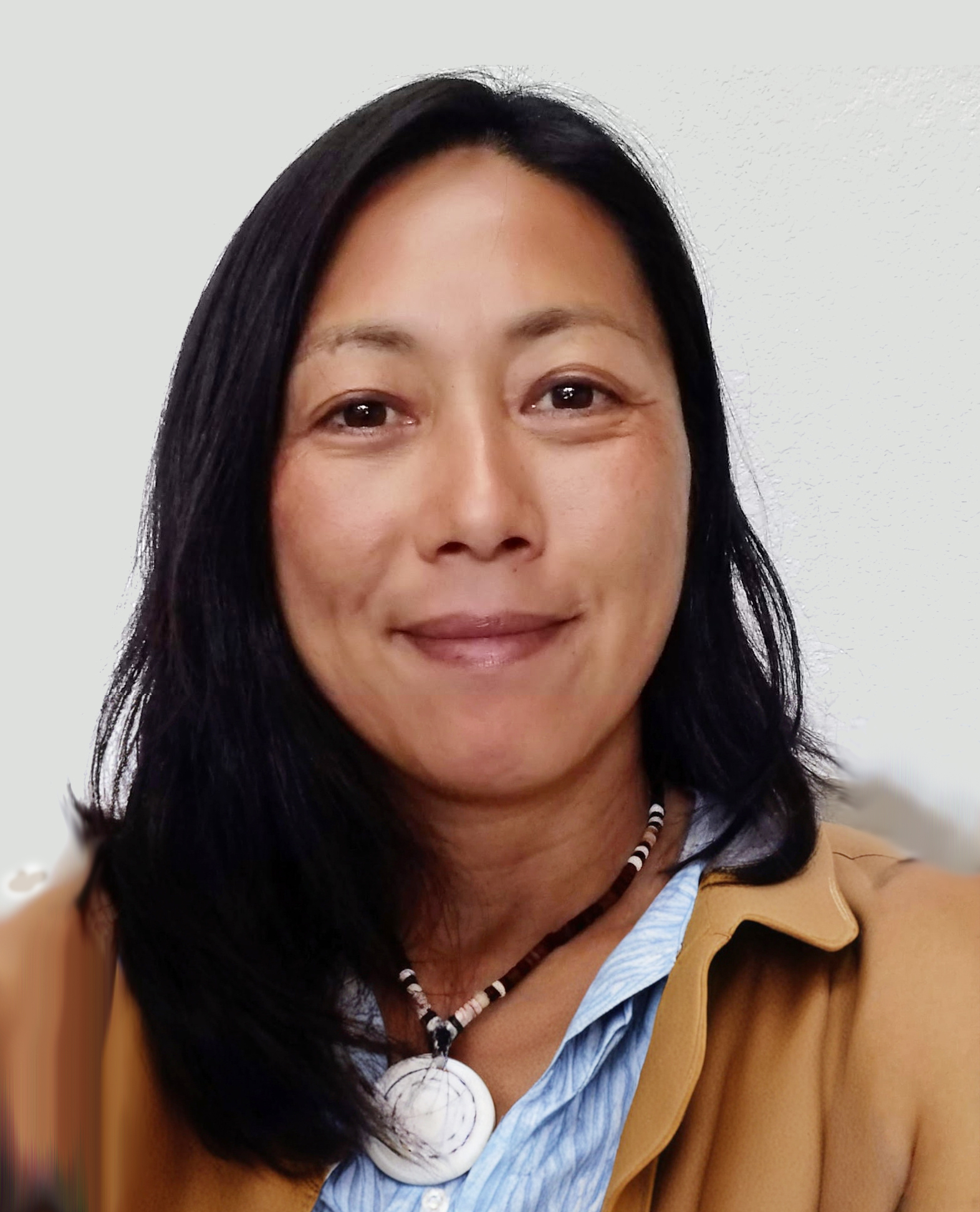 long dark hair brown skin smiling woman 